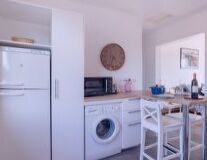 wall, indoor, cabinet, kitchen, floor, home appliance, clock, appliance, white